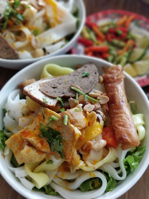 Mi Quang with pumpkin sauce at Tue Tam in Da Nang