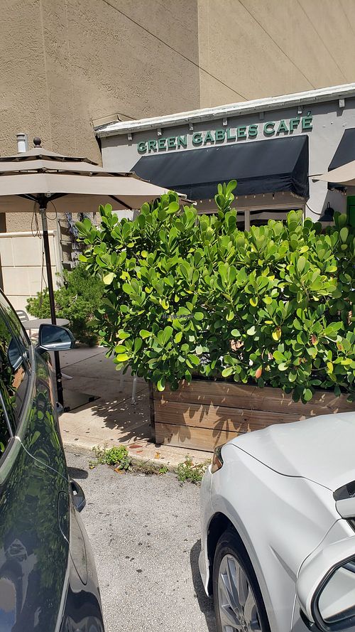 Front. A few tables outside at Green Gables Cafe in Coral Gables