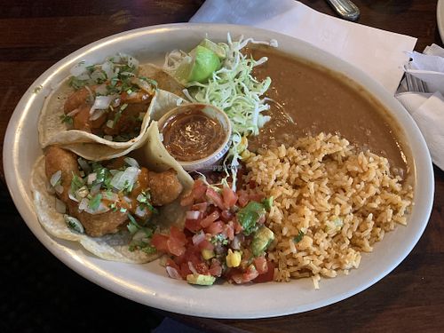 Avocado tacos with refried beans and rice  at Lake Alice Trading Co in Riverside