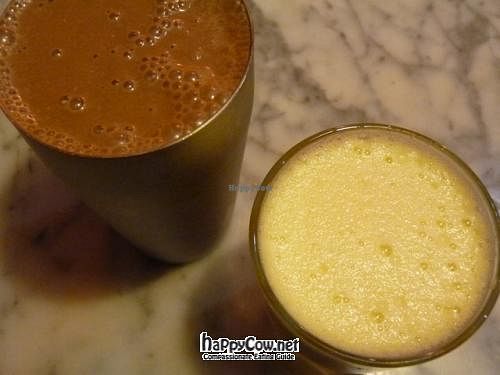 Banana Go-go smoothie (banana, coconut, cocoa, soy milk, ice) & Apple-passion fruit-kiwi juice at Juicy Jones - Hospital in Barcelona