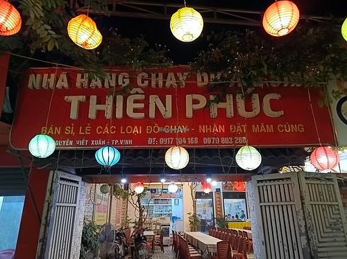 Street signage at night at Thien Phuc in Vinh
