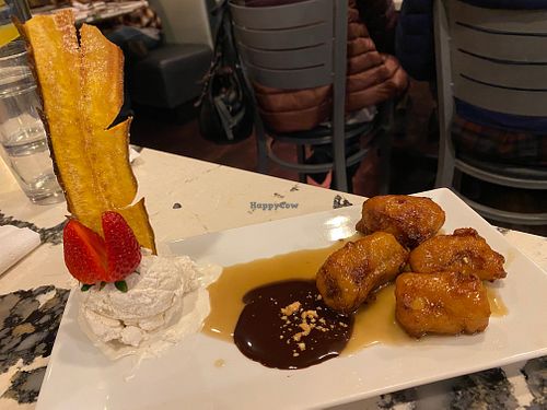 Special vegan dessert of fried banana with ginger chocolate sauce and oat milk ice cream at Viet Thai Cafe in York