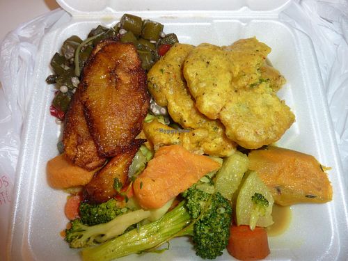 Pasta veggies, collards, spicy lentils over rice & peas, plantains. Oh so good. Not pictured, the awesome sweet potato cornbread. at Healthful Essence in Atlanta