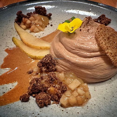 Chocolate dessert with pear and crumblee  at the friendly kitchen in Paris
