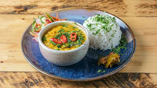 Mixed Vegetable Dhall
Lentils cooked until soft than mixed in with a masala of onions, garlic, ginger, cumin, curry leaves, and chillies. + Rice, pickle, and salad.

Vegan - GF
 at Dapur Malaysia in Leeds