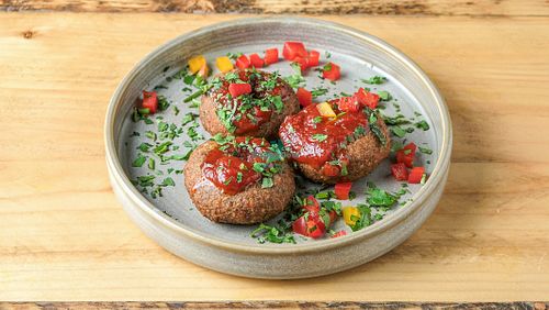 Vadai 
Spiced lentil cakes.  South Indian savoury snack of pulses, soaked then grounded with spices, shaped, and fried. Crispy on the outside and fluffy in the middle. 

Vegan at Dapur Malaysia in Leeds