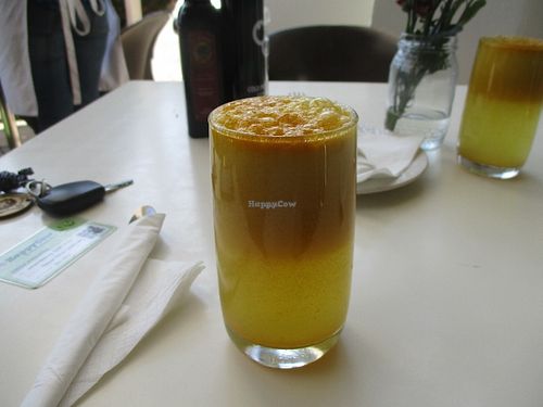 Oh so healthy apple, aloe vera and turmeric freshly squeezed juice. at The Greenside Cafe in Johannesburg