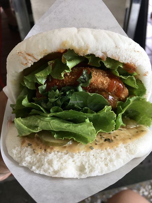 Signature flavour gua bao with a chicken patty, vegetables and burger sauce  at Xiǎo Lái Gua Bāo 小來刈包 in Tainan