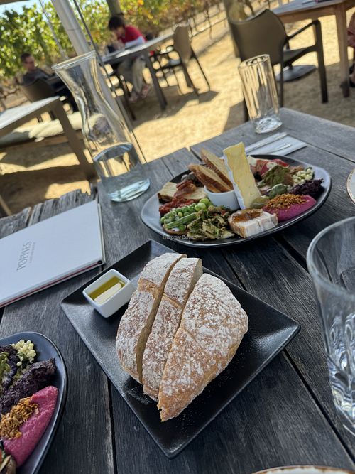 Bread and olive oil (non-vegan platter in the background)  at Poppies in Martinborough