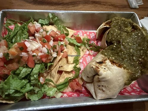 Kind of messy picture but it was a hibiscus burrito and chips and salsa  at Taco Taco in Monteverde