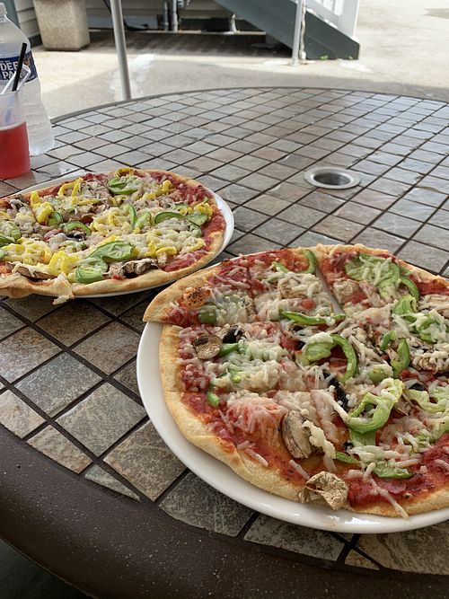 Customizable pizza with vegan cheese at UNO Pizzeria in Oakland