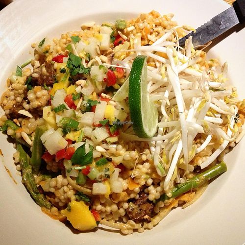 The 'Kingston 12' (vegan option, with tempeh, and as hot as possible): Israeli couscous, red coconut curry, grilled asparagus, jicama-mango salsa, almonds, mung bean sprouts ... at Nine Mile Montford in Asheville