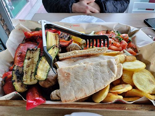 Yum. Zucchini balls and fresh salad underneath. at Souvlaki Lovers in Nicosia