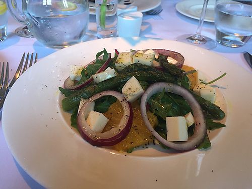 Asparagus, orange and red onion salad starter with vegan cheese at Fellinis in Ambleside