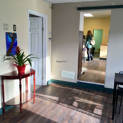 A second sunny room with table seating for an additional four people. at The Good Lands Cafe in Winnipeg