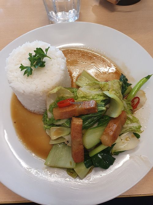 Pork with Chinese broccoli at Madame K's Vegan- CBD in Melbourne