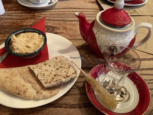 Hummus & pitta plus Persian rose tea with saffron sugar stick  at Leila's Kitchen in Hebden Bridge