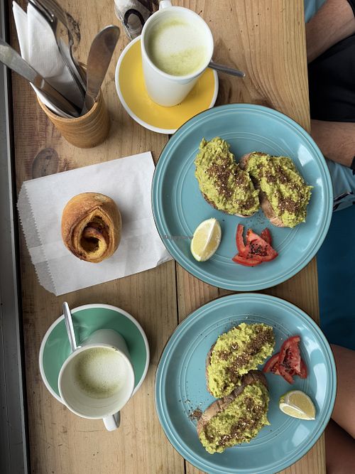 lovely avo on ciabatta and oat matcha latte after surf session! staff is super friendly, there’s lots of vegan options including pastries and raw desserts! lovely atmosphere!  at Hang Ten Cafe in Muizenberg