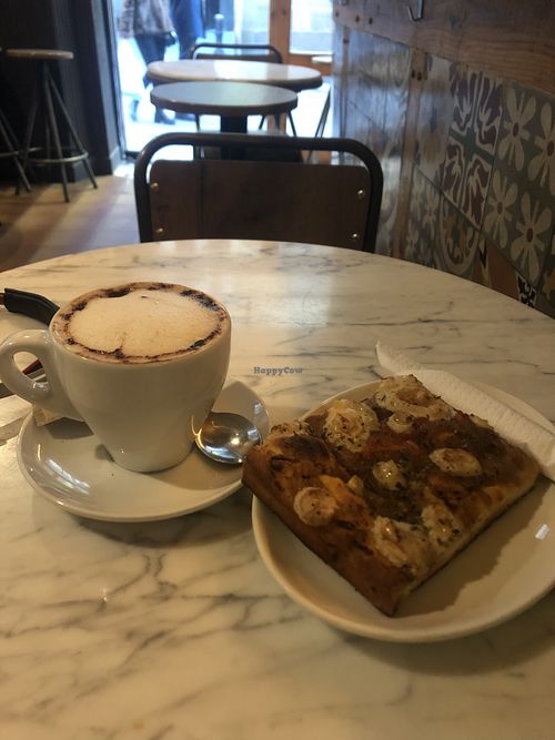 Cappuccino and focaccia   at The Vegan Corner in Barcelona