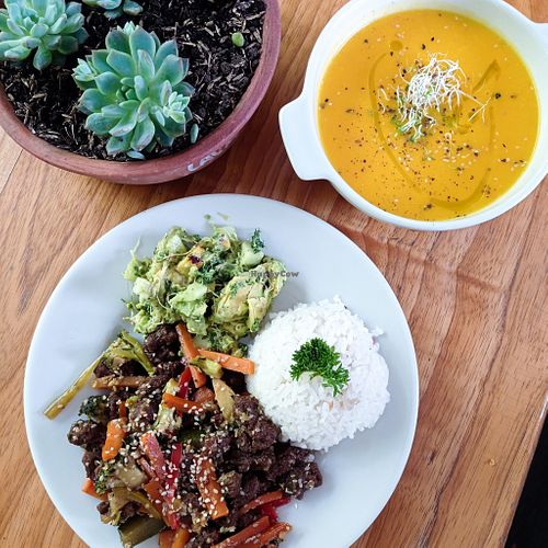 pumpkin and red pepper soup with veggies and soy protein sauté in teryaki sauce with salad and citronela rice  at Lulo's Restaurante in Jardin
