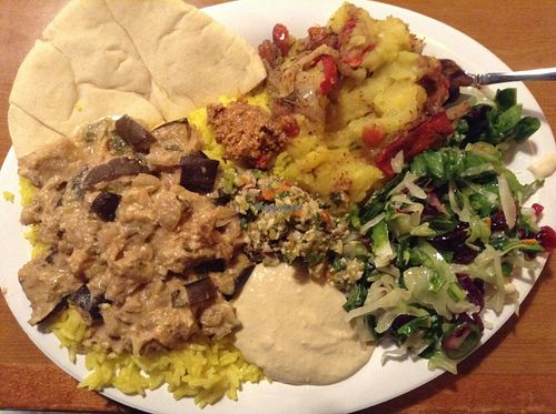 Saturday buffet, eggplant something, vegan potatoes, salad and rice. at Sanaa's 8th St. Gourmet in Sioux Falls