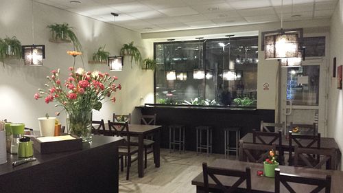 View towards the entrance; seen from the service area. Clean, light and warm interior. at Wat Kam Chu in Gdynia