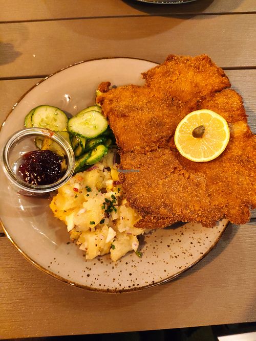 Wie"ner"schnitzel mit Kartoffel und Gurkensalat.
Schnitzel Vienna-Style with potato salad and cucumber salad. at Försters in Berlin