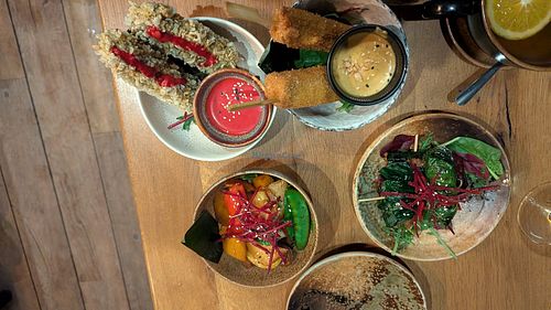 Various delicious small bites to share at TA Vegan House in Hamburg