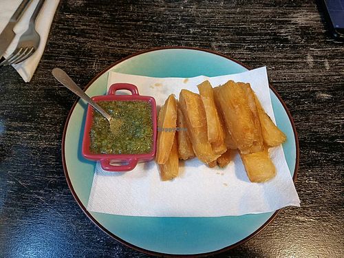 Yuka fries with the amazing sauce. at L'Arepa in Bordeaux