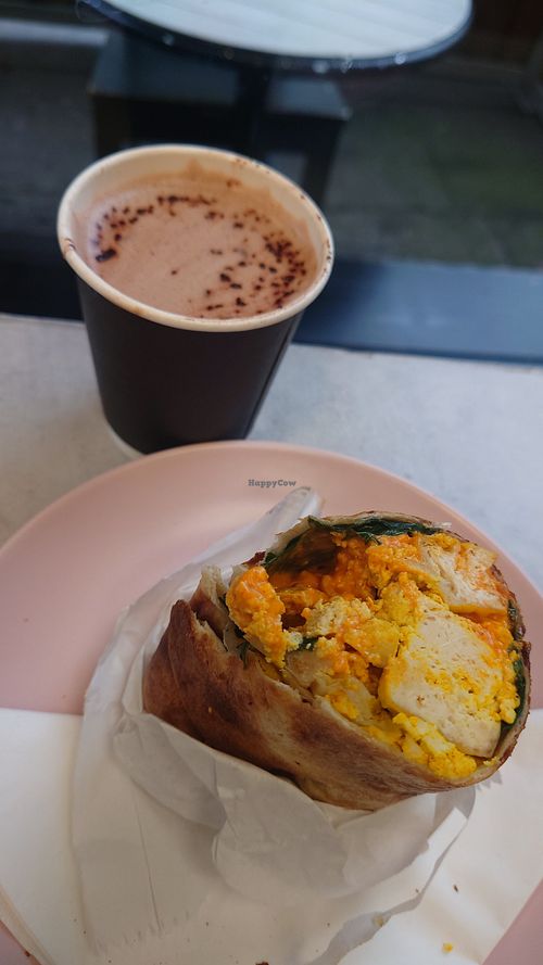 Scrambled tofu wrap and hot chocolate at It's a Trap in Dublin