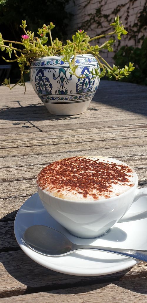 Almond milk cap on the courtyard at Olivia's Pantry in Kyneton