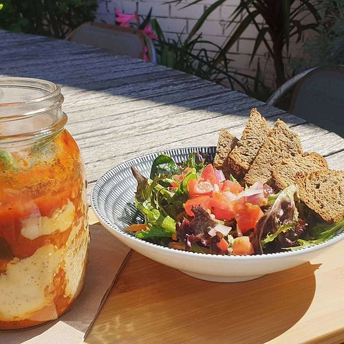Eggplant parma slow cooked in the jar with a side salad at Olivia's Pantry in Kyneton
