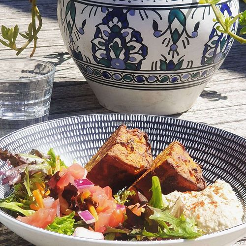 Savoury muffin served with humous and salad at Olivia's Pantry in Kyneton