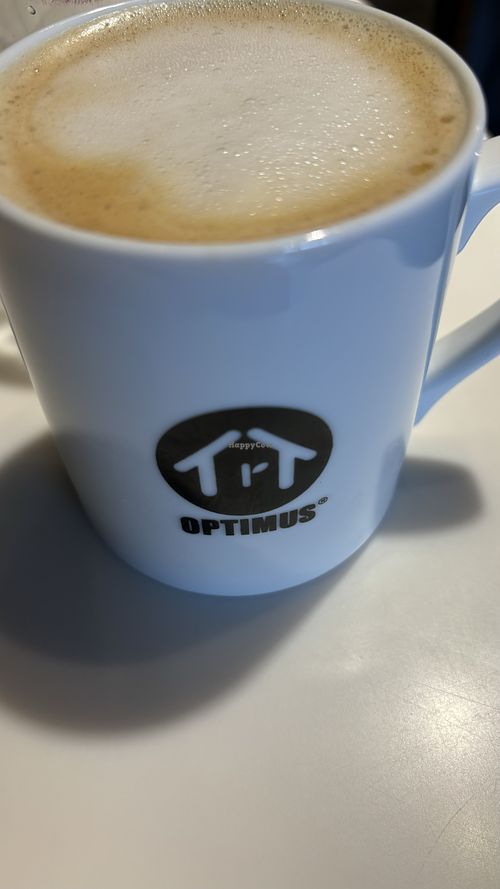 Oat milk cafe latte a bit sweet for me  at Optimus Cafe in Osaka