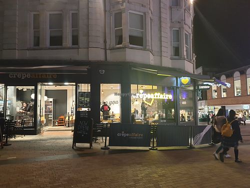 Storefront with outdoor seating. at Crêpeaffaire in Bromley