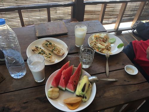 Garlic bread, banana soy milkshake and fried rice with veggies and egg (optional)  at Green Climbers Home in Thakhek