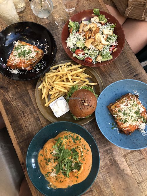 Basil tortellini, lasagna, burger, and Cesar salad   at Palo Verde in Prague