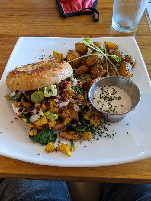 Tofu scramble bagel at Karma in Jaco