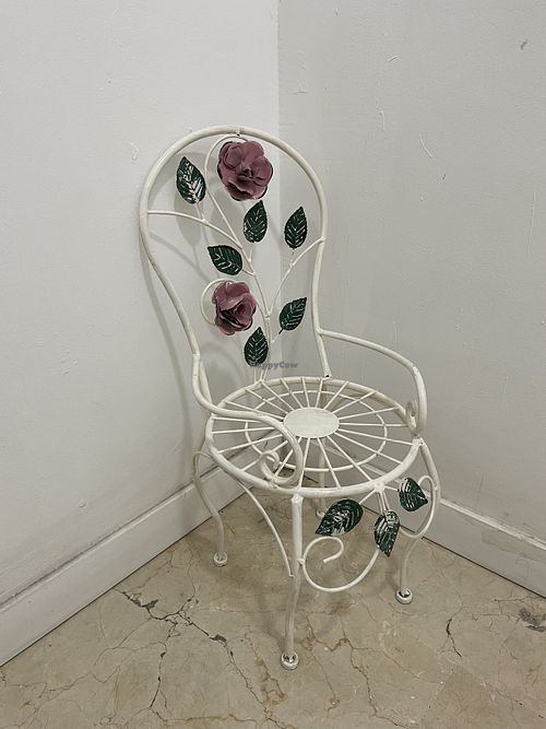 mini chair in the toilet 🤣  at Hi! Bubble tea Patisserie in Gran Canaria