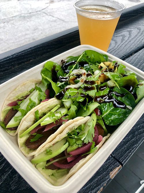 Vegan street tacos with side salad and mango kombucha on tap  at Good Thyme in Lakeland