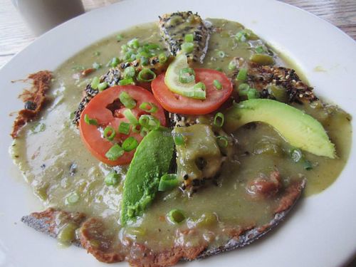 Tempe dish smothered in green chile. at Adam's Mountain Cafe in Manitou Springs