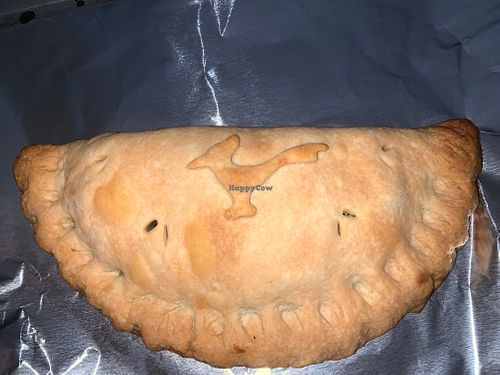 Take n bake vegan samosa with a roadrunner on top of the pastry at Boo's Organic Oven in Joshua Tree