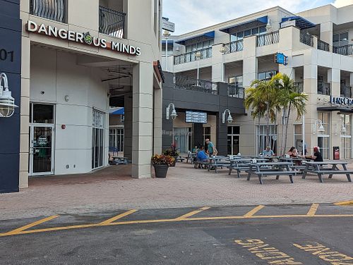 Entrance and outdoor seating  at Dangerous Minds Brewing Co in Pompano Beach