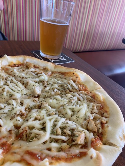 Pizza with oomph sausage and Violife cheese at Dangerous Minds Brewing Co in Pompano Beach
