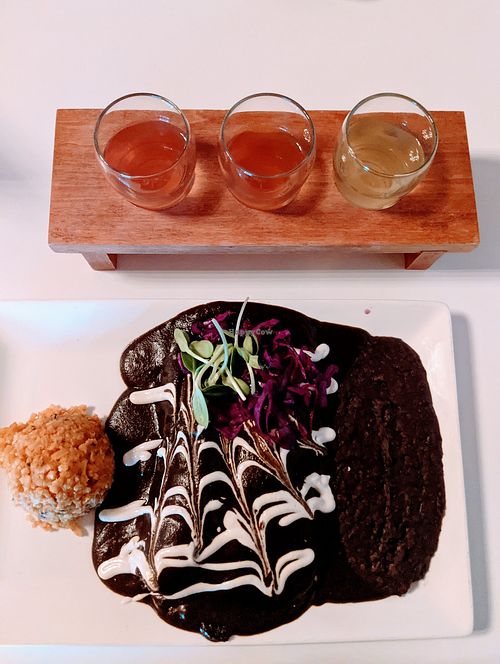 Mole Enchiladas 😍 at The Village in San Diego