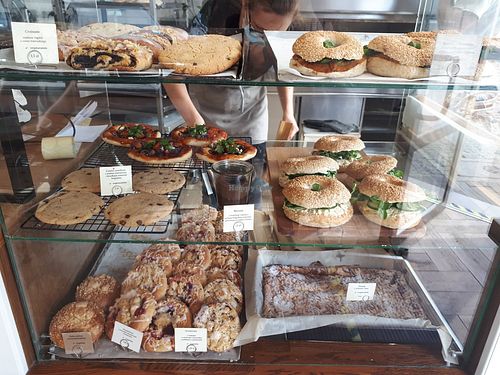 The sign says if it's vegan vegetarian or nor at Bread House in Torun