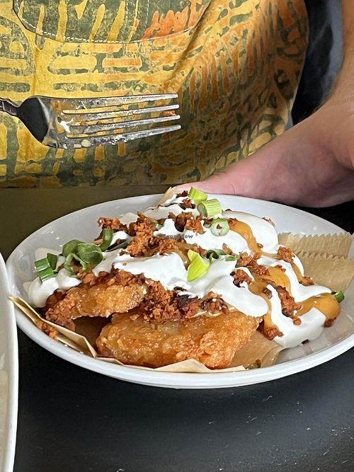 Loaded soyrizo, queso and sour cream hashbrowns at 4th & State in Columbus