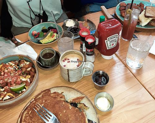Vegan blueberry pancakes, vegan potatoes, Rose Latte (ahhh).  at Bearcat Cafe - CBD in New Orleans
