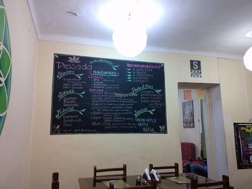 Menu on a blackboard inside Prasada at Prasada in Cusco