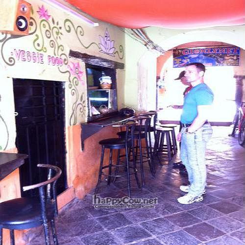 Old location, from 2010, View of the ordering window and seating area, as you enter the alley/restaurant. at Prasada in Cusco